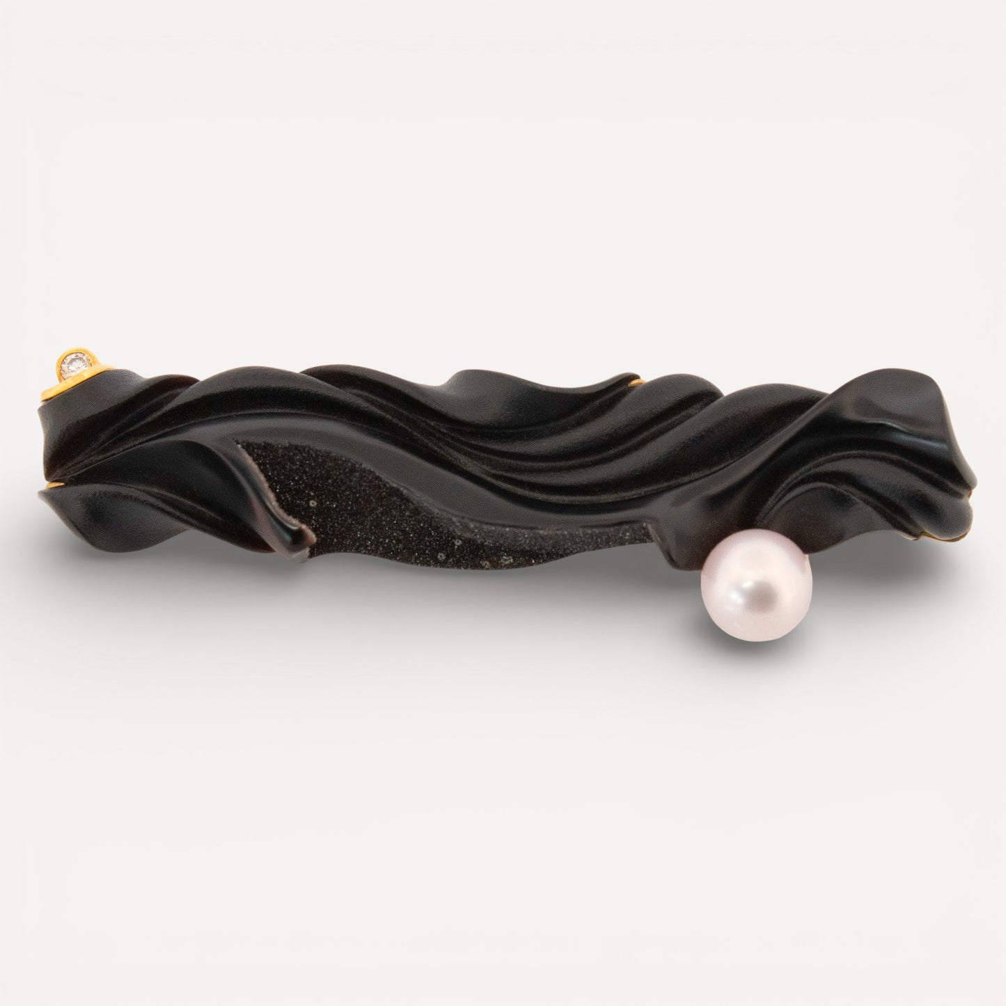 Black Chalcedony and druse carving by Steve Walters, set in an 18kt brooch pendant by ART Guyon for Cynthia Scott Jewelry.