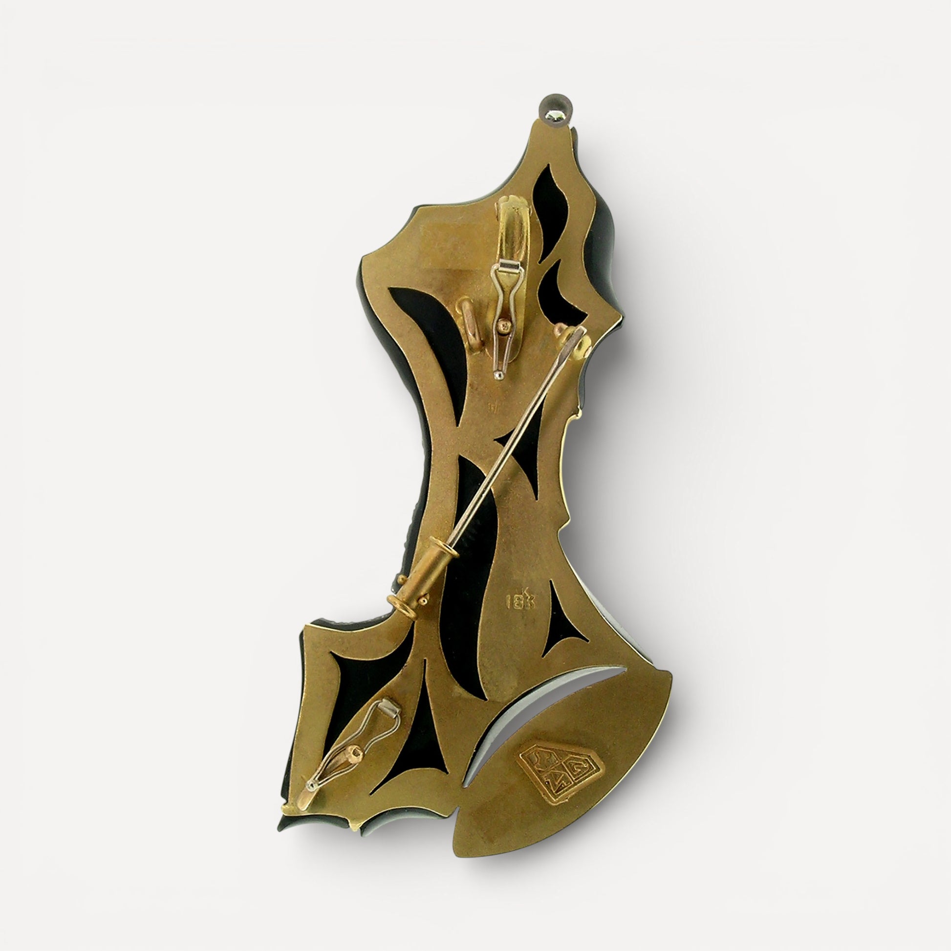 A black chalcedony carving by Steve Walters in an 18kt brooch and pendant with a diamond and Australian opal, made by ART Guyon for Cynthia Scott Jewelry.