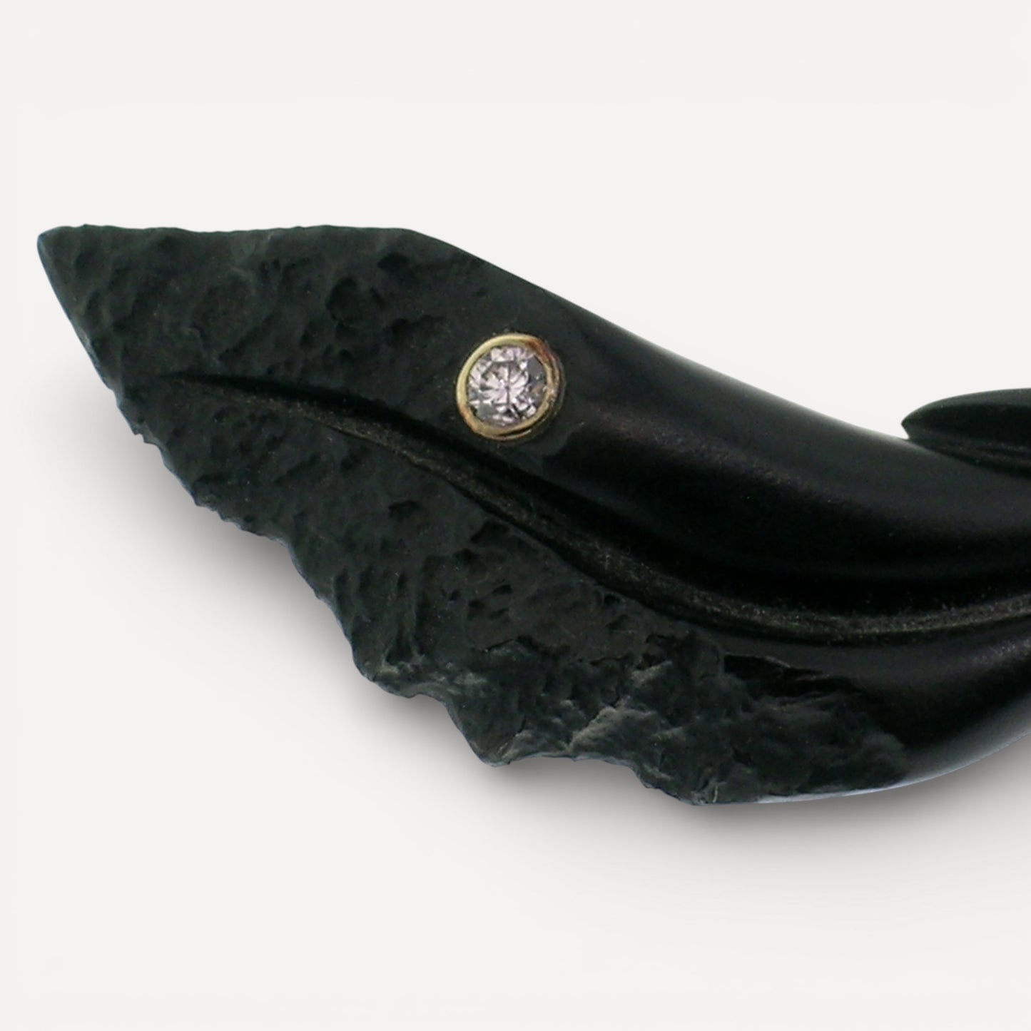 Steve Walters chalcedony carving with an Oregon Sunstone and pink diamond for Cynthia Scott Jewelry