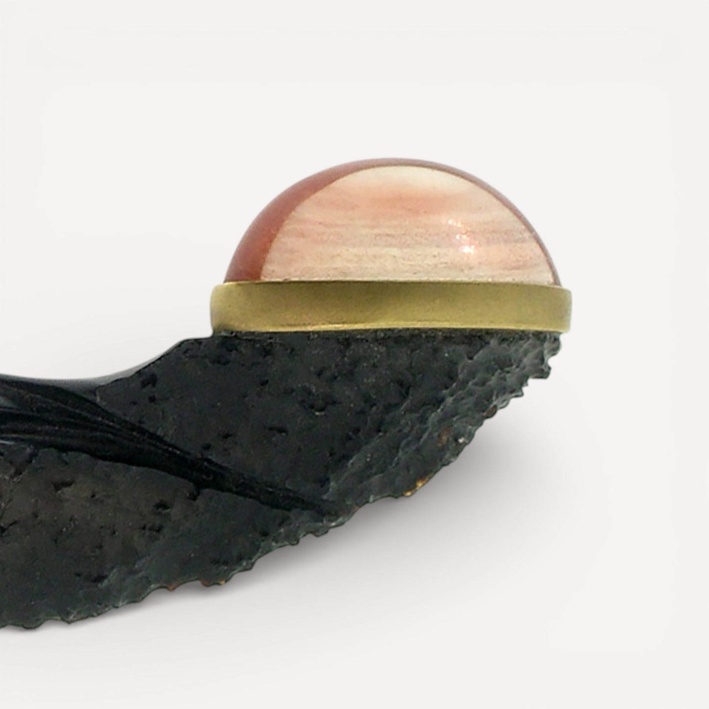 Steve Walters chalcedony carving with an Oregon Sunstone and pink diamond for Cynthia Scott Jewelry