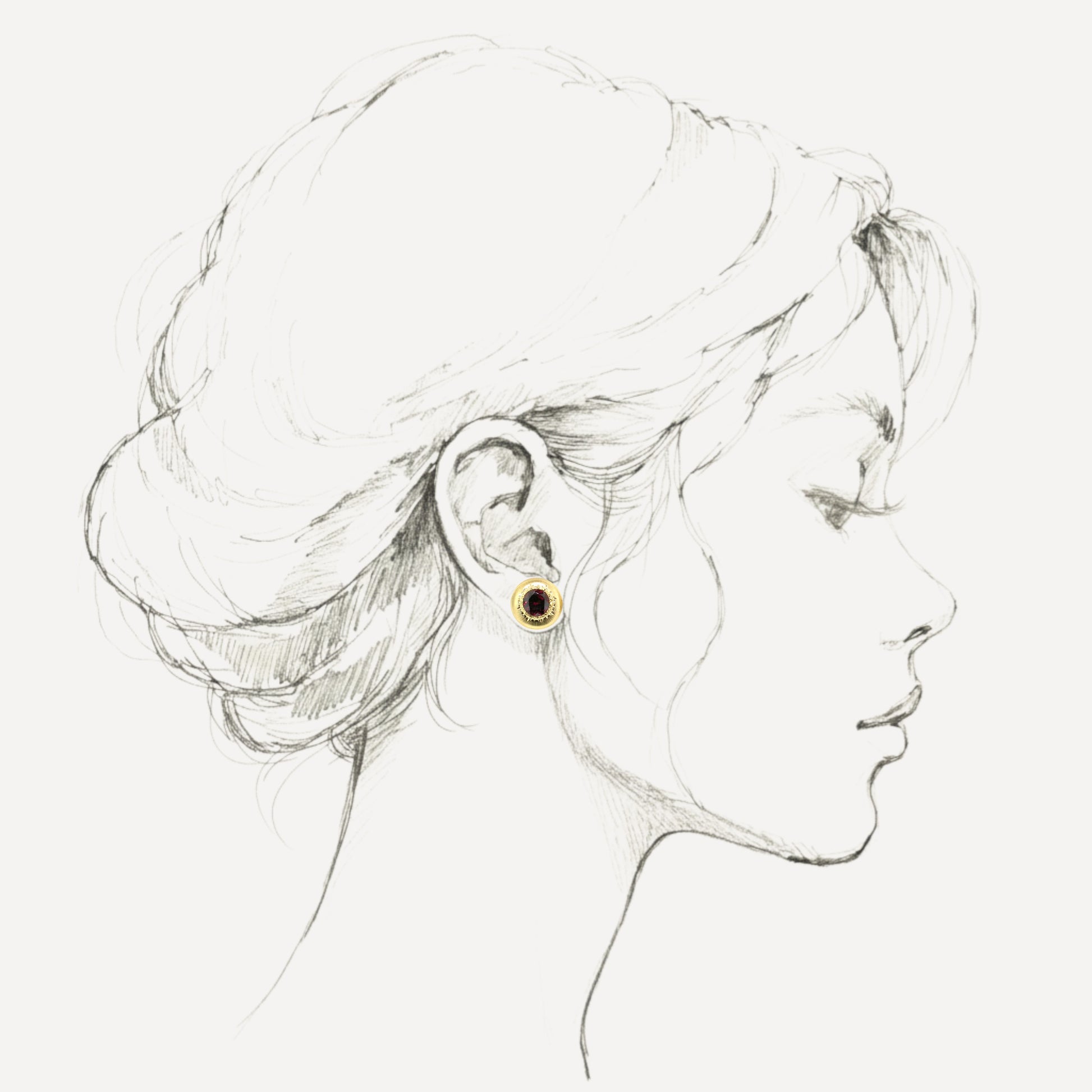 A pair of 18kt yellow gold earrings, Florentine engraved, featuring a pair of Rhodolite Garnets. Made in Florence, Italy for Cynthia Scott Jewelry.