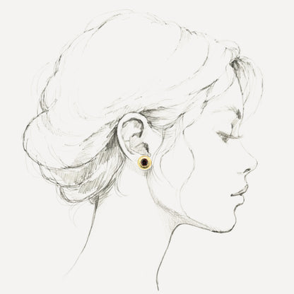 A pair of 18kt yellow gold earrings, Florentine engraved, featuring a pair of Rhodolite Garnets. Made in Florence, Italy for Cynthia Scott Jewelry.