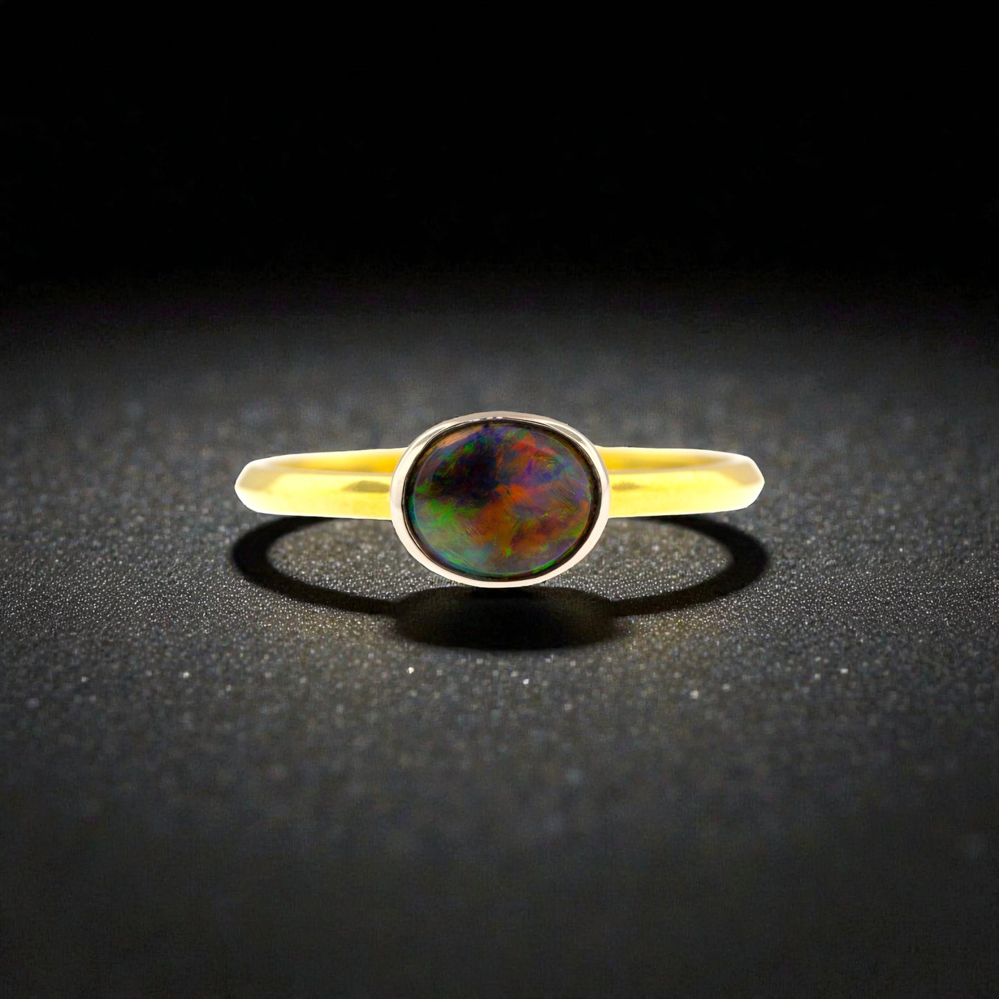 Lightening Ridge Black Opal from Australia in 18kt and Platinum Paloma Ring made in USA by Cynthia Scott Jewelry.