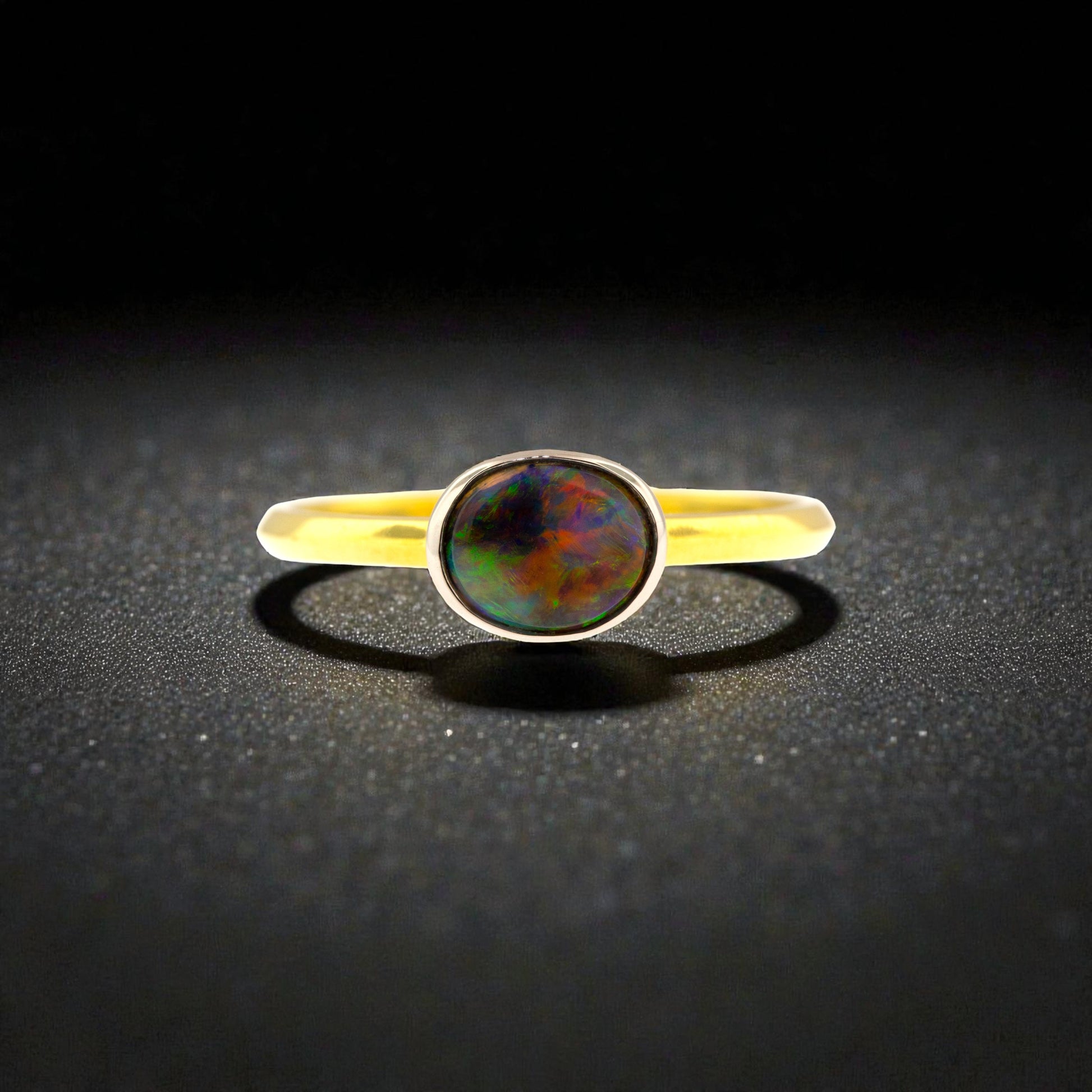 Lightening Ridge Black Opal from Australia in 18kt and Platinum Paloma Ring made in USA by Cynthia Scott Jewelry.