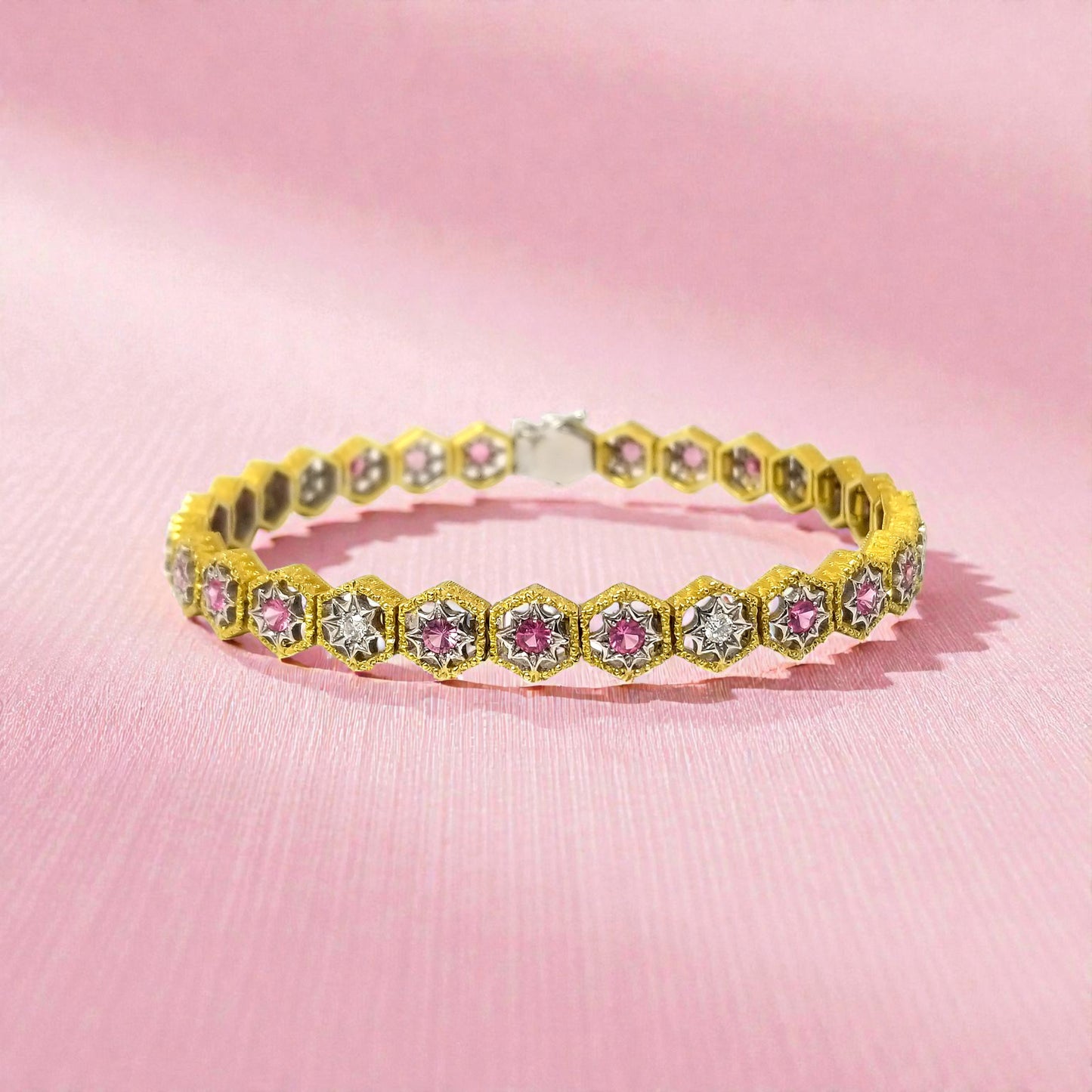 An 18kt Florentine Engraved bracelet with Mahenge pink spinels and diamonds. Made in Florence, Italy by Cynthia Scott Jewelry.