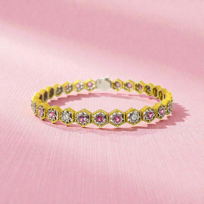 An 18kt Florentine Engraved bracelet with Mahenge pink spinels and diamonds. Made in Florence, Italy by Cynthia Scott Jewelry.
