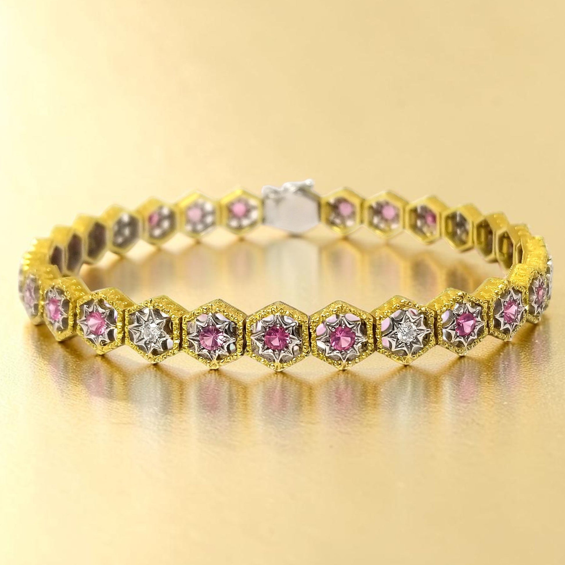 An 18kt Florentine Engraved bracelet with Mahenge pink spinels and diamonds. Made in Florence, Italy by Cynthia Scott Jewelry.