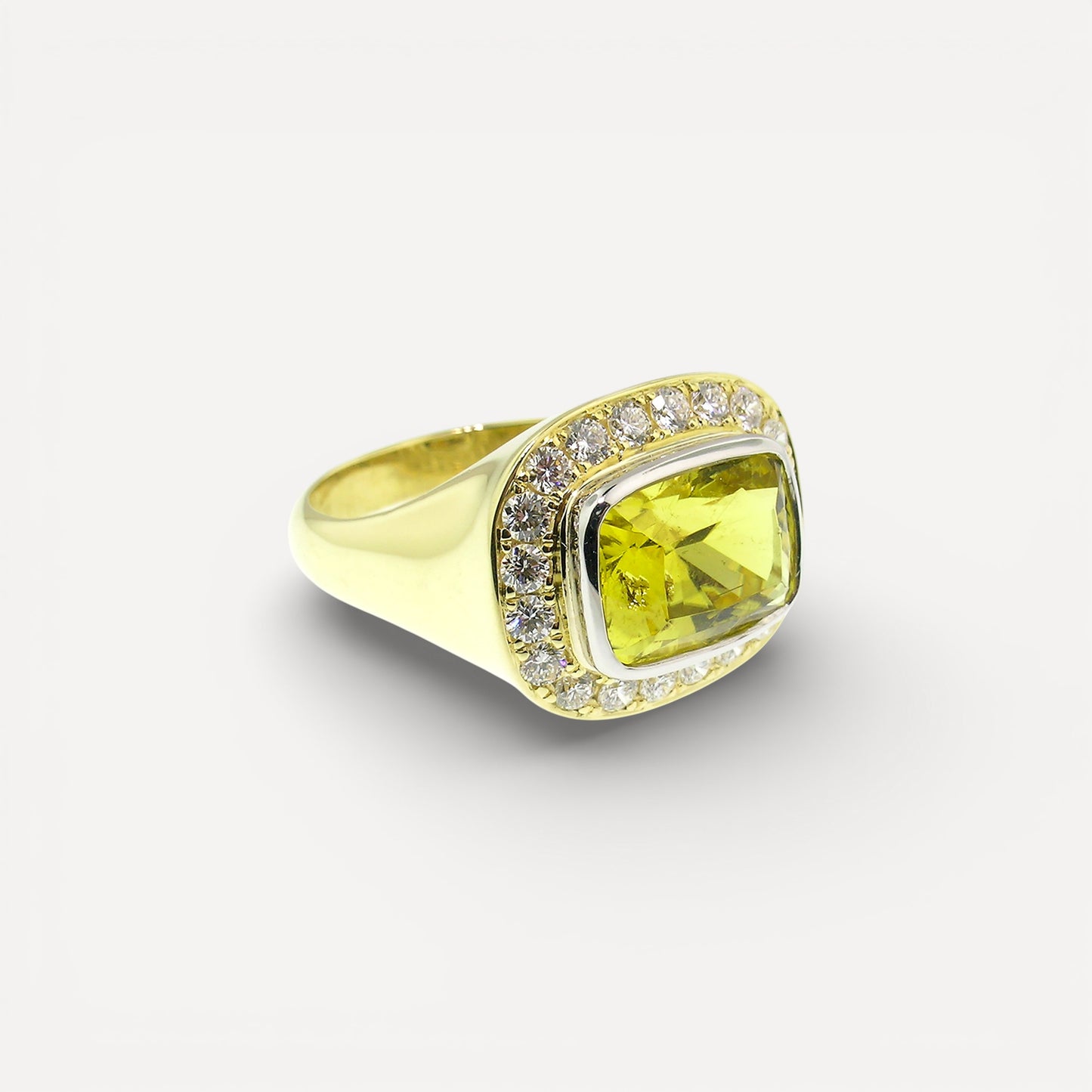 A canary tourmaline in an 18kt and Diamond Aphrodite Ring made in USA by Cynthia Scott Jewelry.