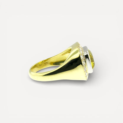 A canary tourmaline in an 18kt and Diamond Aphrodite Ring made in USA by Cynthia Scott Jewelry.