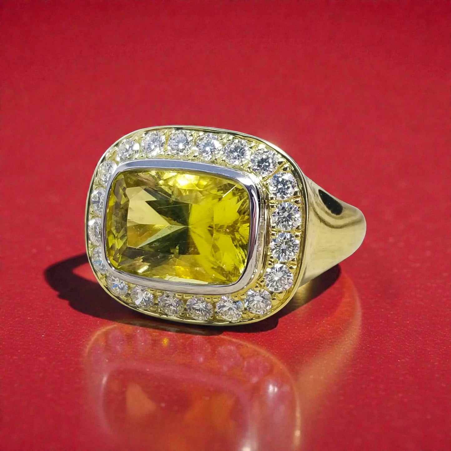A canary tourmaline in an 18kt and Diamond Aphrodite Ring made in USA by Cynthia Scott Jewelry.