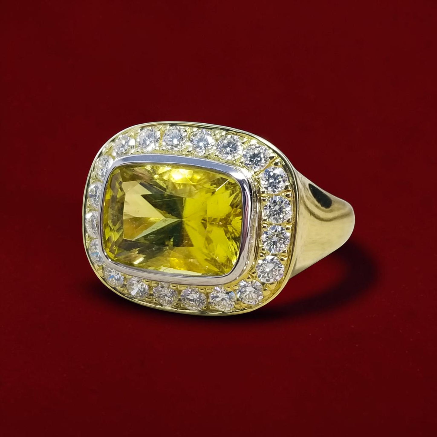A canary tourmaline in an 18kt and Diamond Aphrodite Ring made in USA by Cynthia Scott Jewelry.