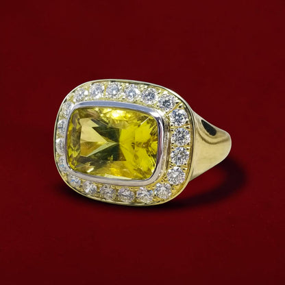 A canary tourmaline in an 18kt and Diamond Aphrodite Ring made in USA by Cynthia Scott Jewelry.