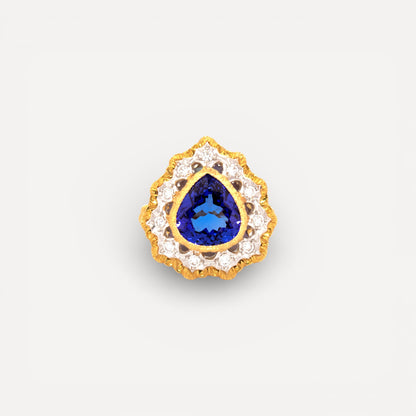 A pear shaped tanzanite in an 18kt and diamond Giulia ring made in Italy by Cynthia Scott Jewelry