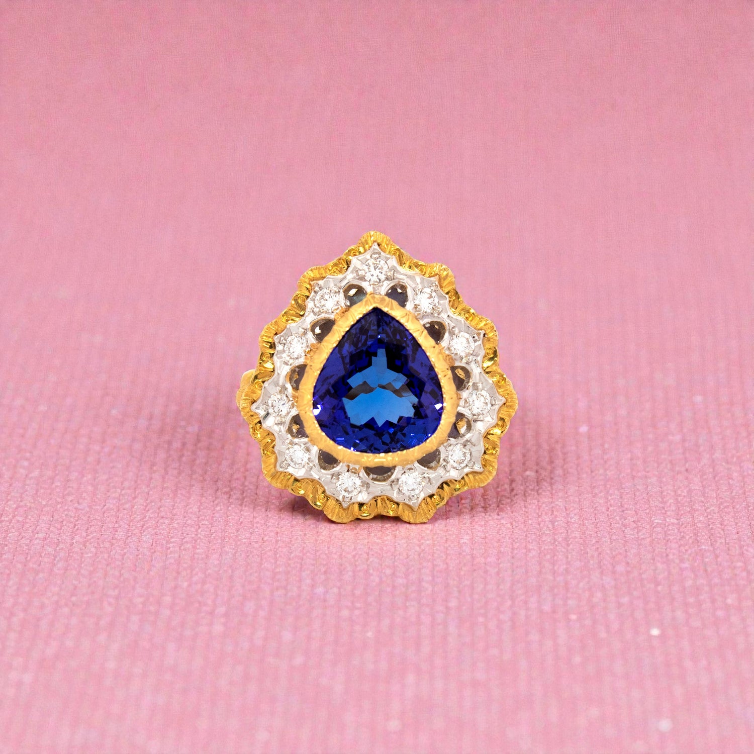 A pear shaped tanzanite in an 18kt and diamond Giulia ring made in Italy by Cynthia Scott Jewelry