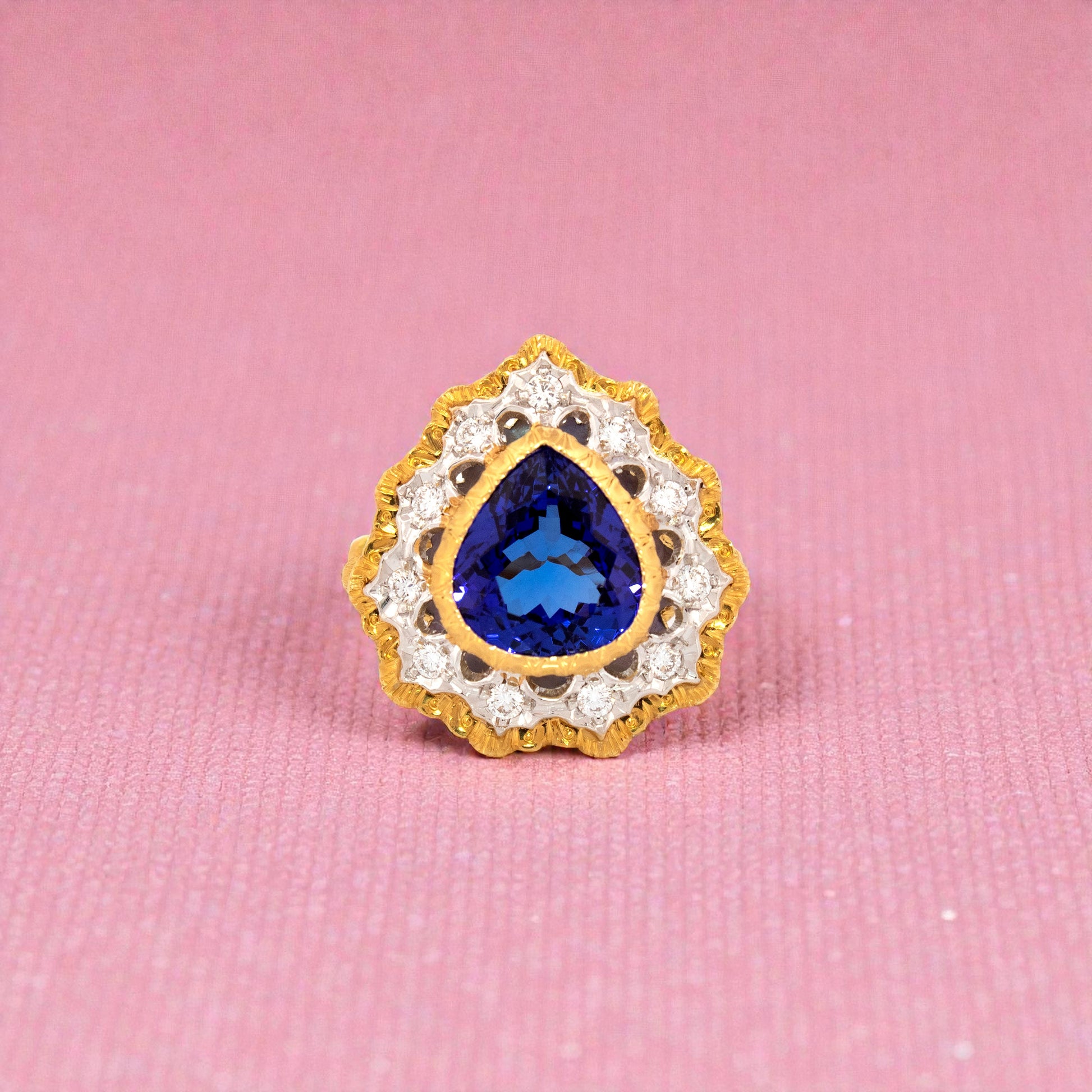 A pear shaped tanzanite in an 18kt and diamond Giulia ring made in Italy by Cynthia Scott Jewelry
