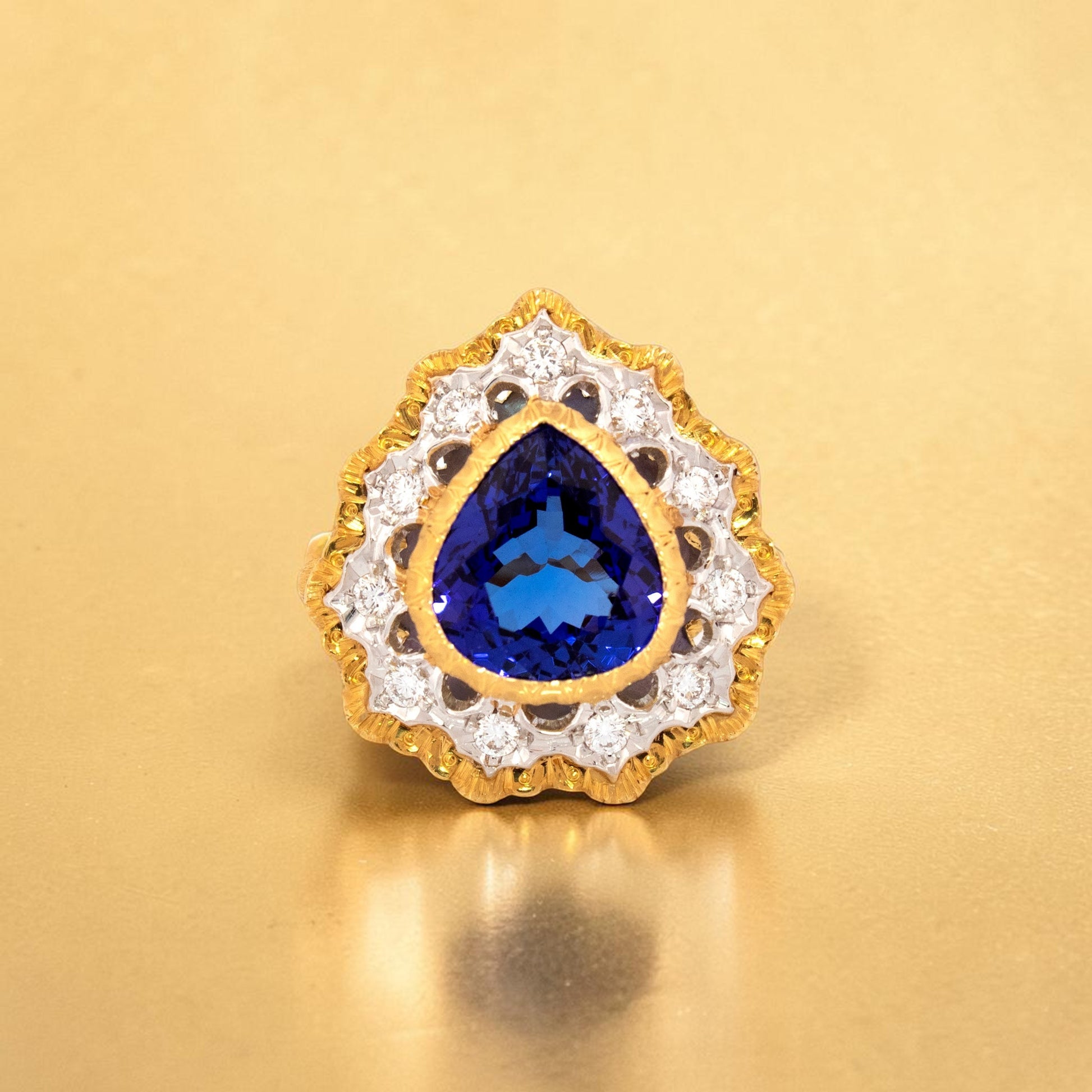 A pear shaped tanzanite in an 18kt and diamond Giulia ring made in Italy by Cynthia Scott Jewelry