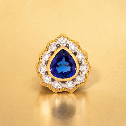 A pear shaped tanzanite in an 18kt and diamond Giulia ring made in Italy by Cynthia Scott Jewelry